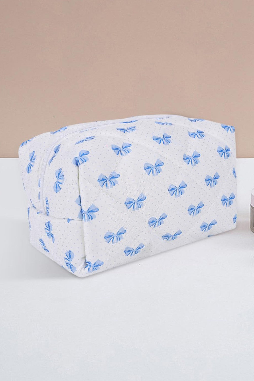BOW QUILTED ZIPPER MAKEUP BAG