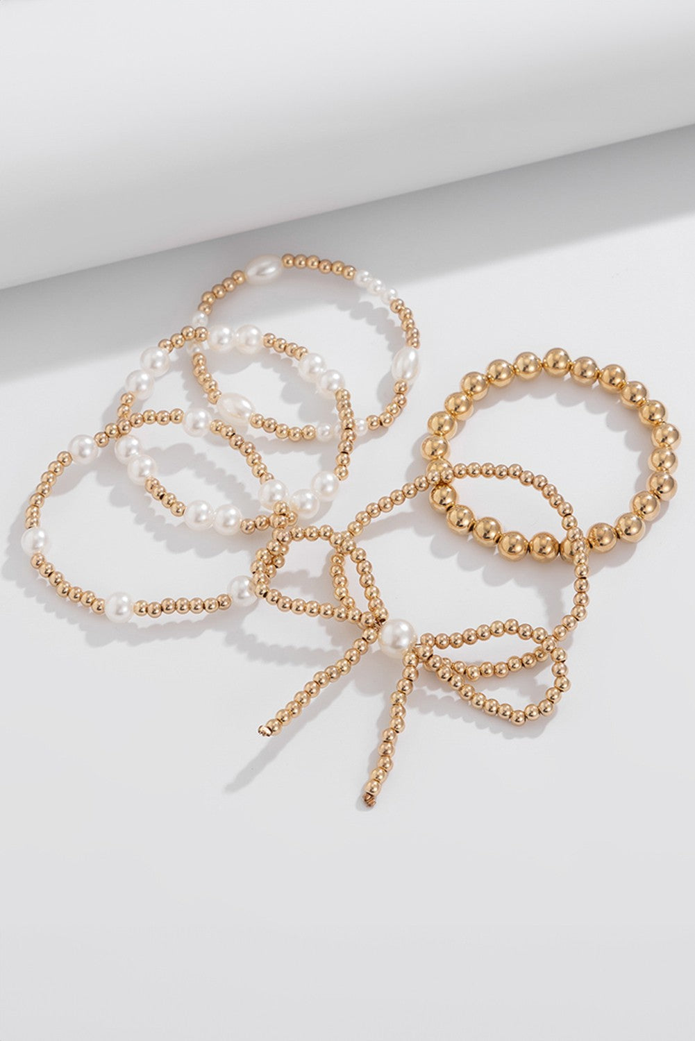 BOW KNOT PEARL BEADED BRACELET