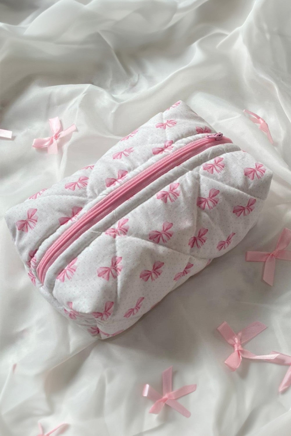 BOW QUILTED ZIPPER MAKEUP BAG