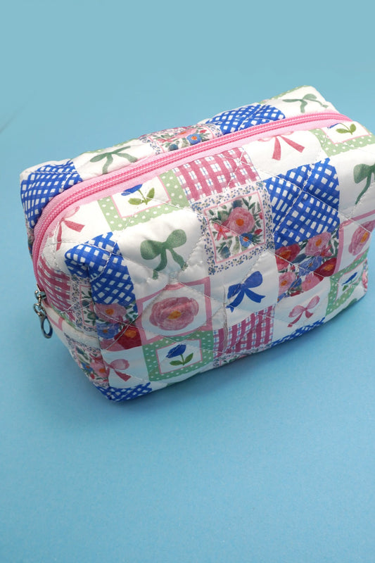 QUILTED FLORAL COSMETIC POUCH